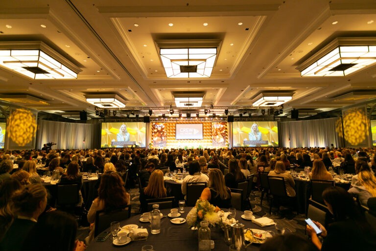 CREW Network picture of stage from back of room