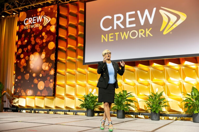 CREW Network individual female speaker on stage
