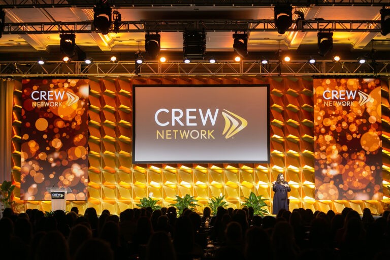 CREW Network individual female speaker on stage