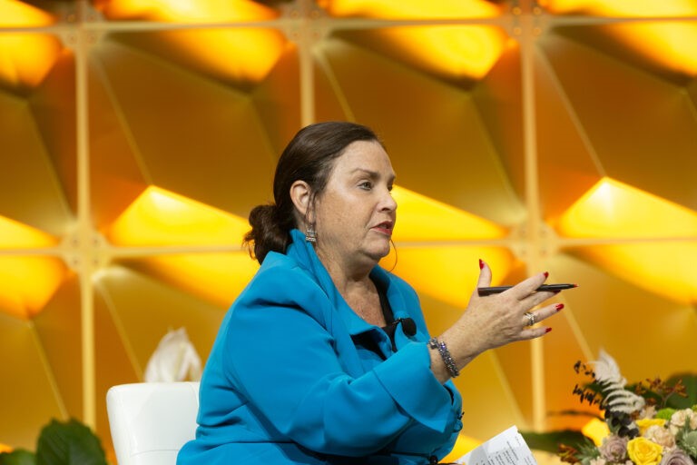 CREW Network individual female speaker on stage