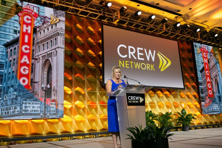 CREW Network individual female speaker on stage